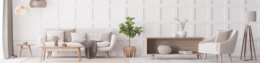Ein schlichtes und modernes Wohnzimmer mit einer Farbkombination von weiß und braun